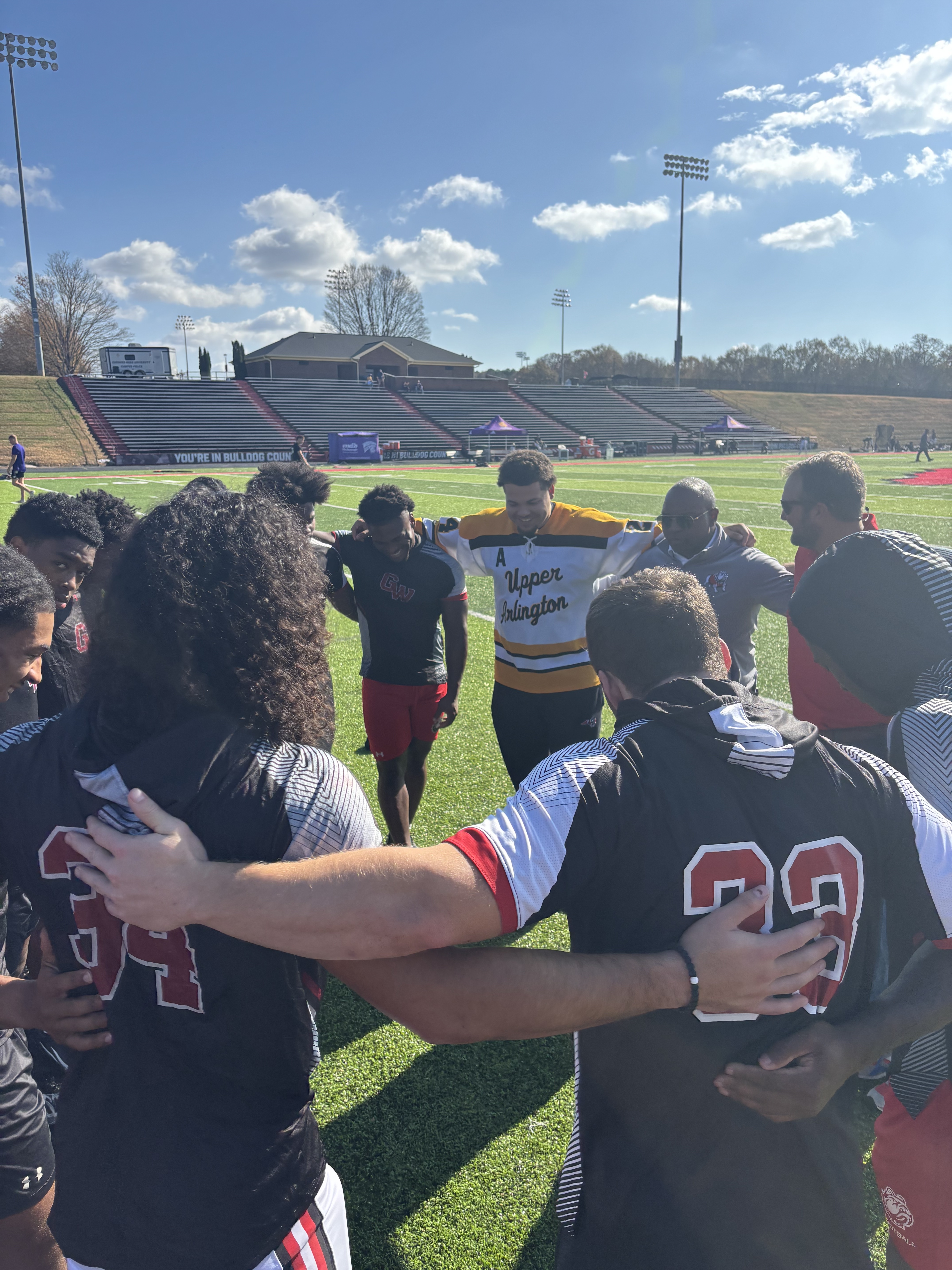 Team huddle on the field