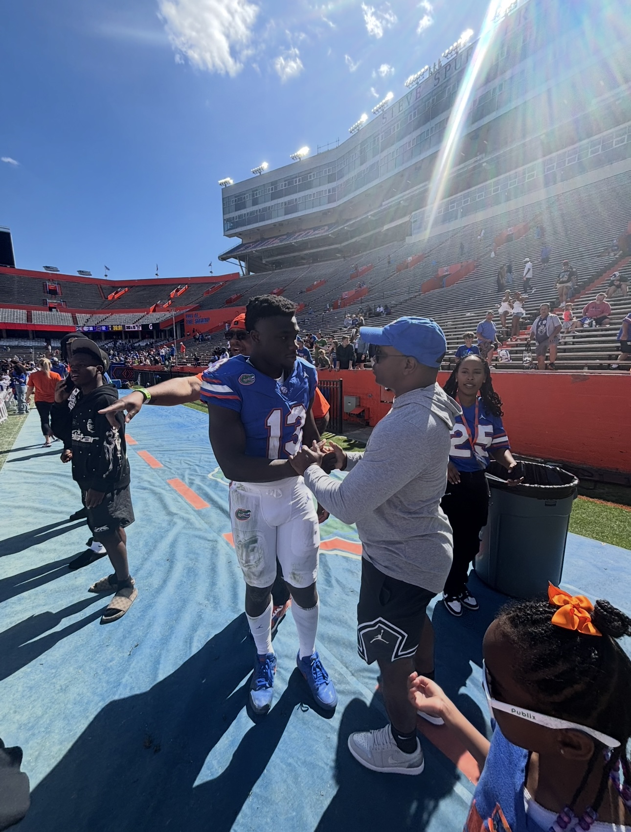 Football player interacts with fans