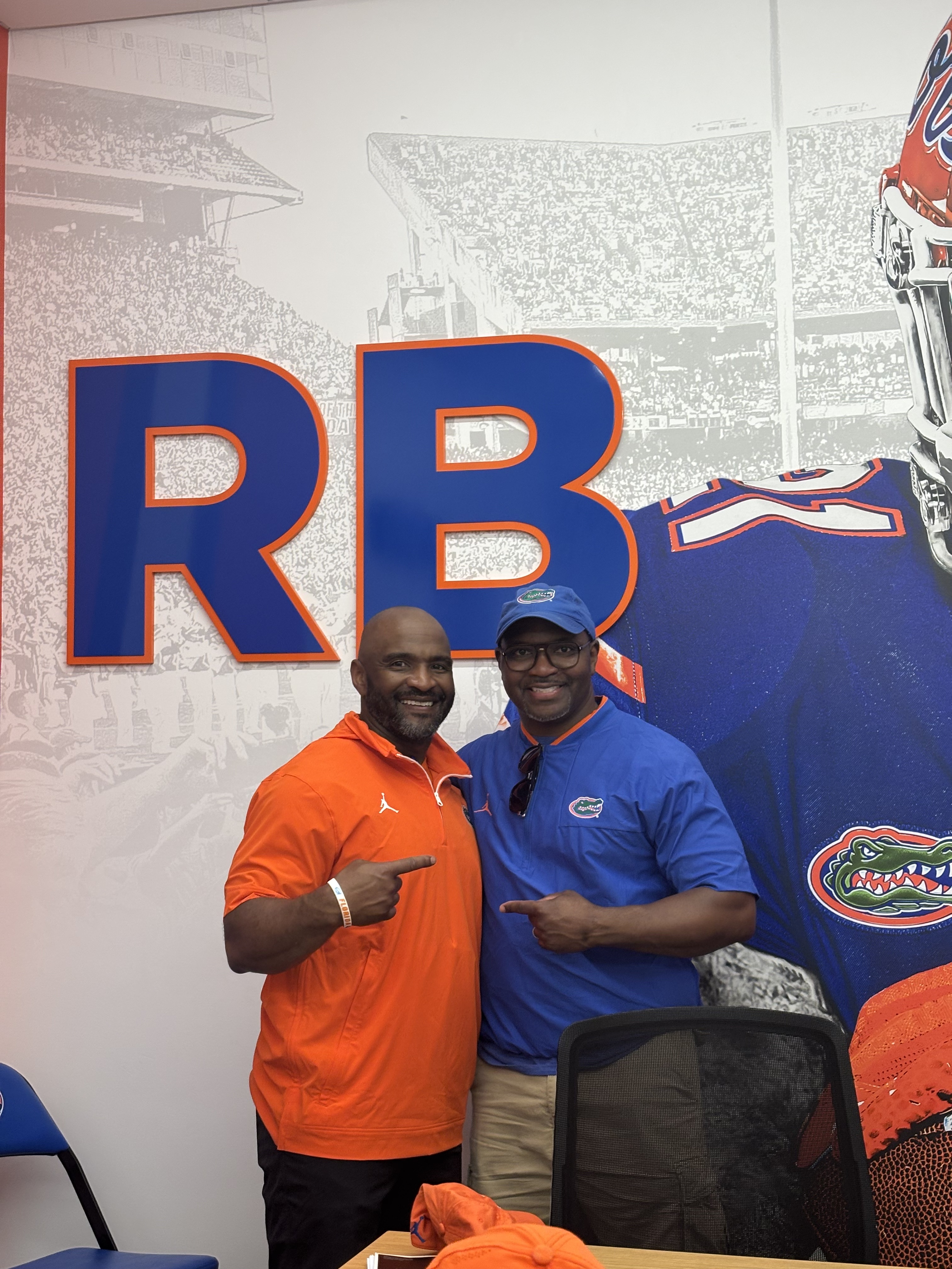 Gameday Pals in Front of Stadium Mural